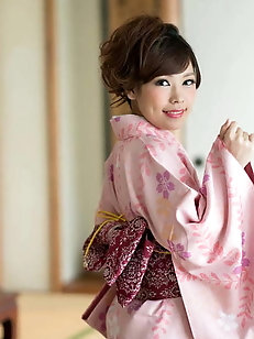 Astonishing japanese damsel is posing undressed on photo
